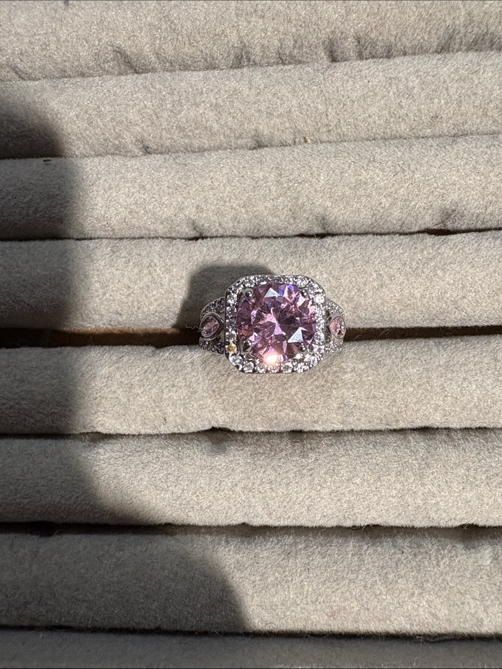 Silver Ring with Pink Center Stone and Halo Accent